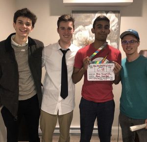 Alex Joseph, second from right, is working with Robert Coakley, second from left, on a short film for his capstone project. Also pictured are Jack Denson, far left, and Zach Pouliot, far right.