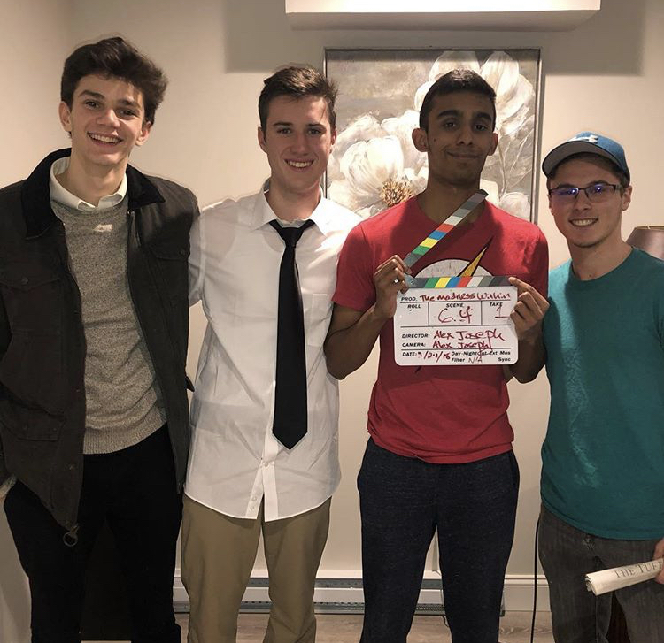 Alex+Joseph%2C+second+from+right%2C+is+working+with+Robert+Coakley%2C+second+from+left%2C+on+a+short+film+for+his+capstone+project.+Also+pictured+are+Jack+Denson%2C+far+left%2C+and+Zach+Pouliot%2C+far+right.
