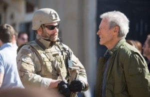 Director Clint Eastwood on set with Bradley Cooper. 