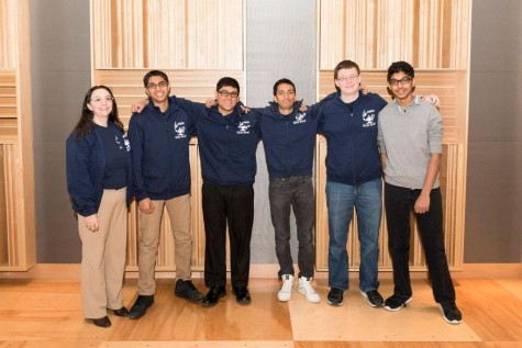 Five members of the Quiz Bowl team with adviser Jessica Bowen after an event.