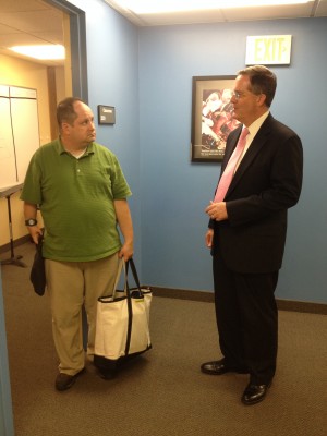 Dr. McCleary chats with history teacher Matt Anderson after a class.