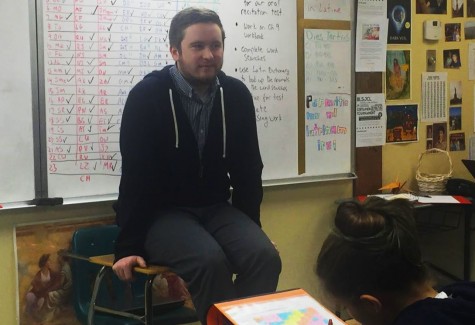 First-year teacher Brian Bakkala teaching a middle school Latin class.
