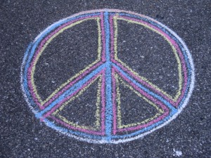 The peace symbol is a combination of the letters 'N' and 'D' of the flag semaphore alphabet, standing for "nuclear disarmament."