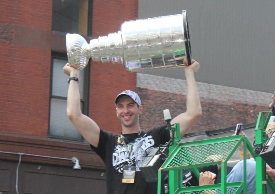 Star+defenseman+Zdeno+Chara+raised+the+Stanley+Cup+after+the+Bruins+last+championship%2C+in+2011.