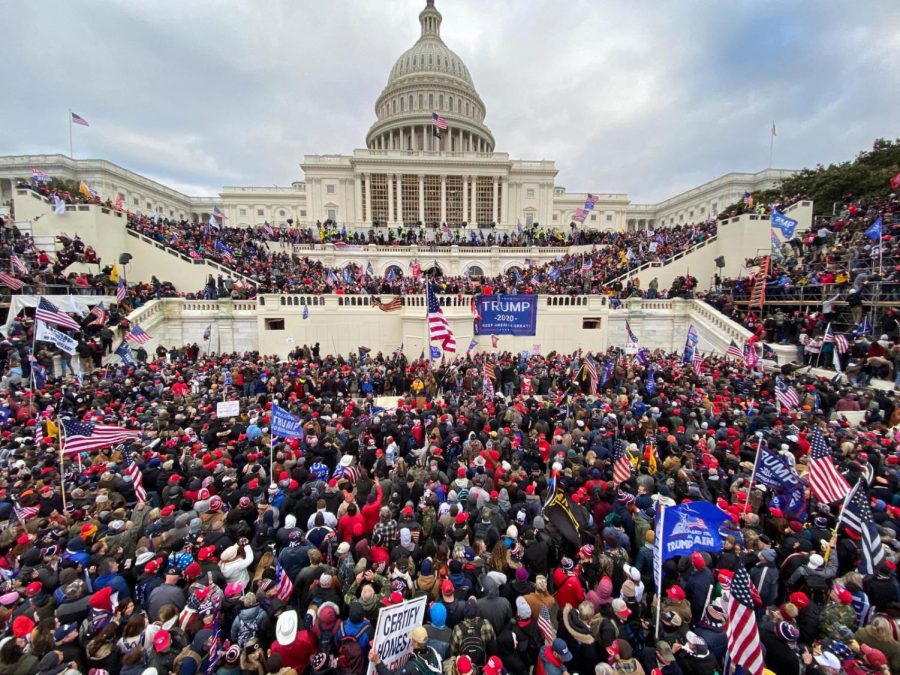 Rioters+stormed+the+U.S.+Capitol+on+Wednesday+as+members+of+Congress+were+ratifying+Electoral+College+results.