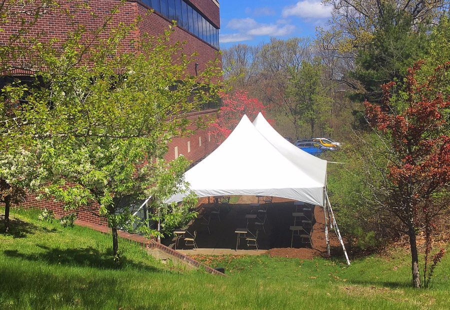A tent behind the Upper School cafeteria gives students access to outdoor seating.